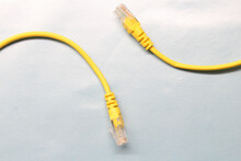 High Angle Shot Of Yellow Wires On A Gray Surface