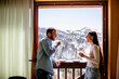 © BGStock72 - Young couple with cups of hot tea at winter window
