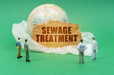 On a green background, blurry figures of people, a plastic bag, a globe and a sign with the inscription Sewage treatment