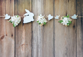  Spring came. Spring decor on wooden old boards background. Easter. Spring holiday background. Love.