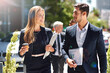 © Arcurs Co-op/peopleimages.com - Making millions on the move. Shot of corporate colleagues having a discussion while walking down the street.