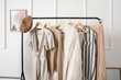 © Pixel-Shot - Rack with stylish clothes in modern studio of fashion stylist