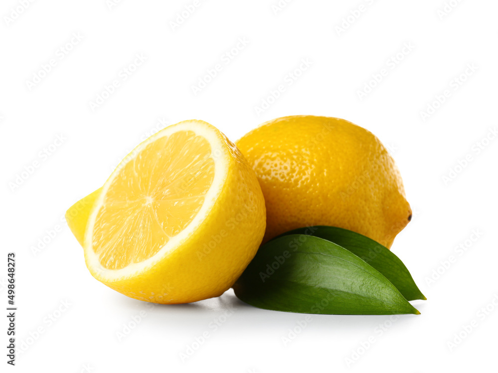 Lemons with leaves on white background