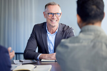 Fototapete - Devising big plans with the boss. Shot of two businessmen having a meeting in an office.