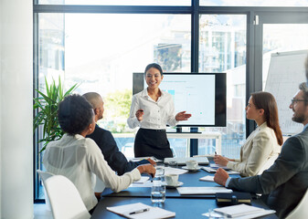 Poster - Teamwork is about achieving greatness together. Cropped shot of a group of business colleagues meeting in the boardroom.