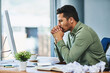 © Katleho Seisa/peopleimages.com - The best ideas take time. Shot of a focused young businessman seated behind his desk and contemplating inside of the office during the day.