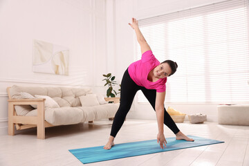 Sticker - Overweight woman doing exercise at home, space for text