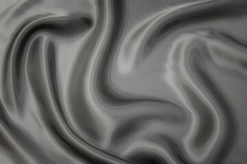 Wall Mural - Close-up texture of natural gray fabric or cloth in black color. Fabric texture of natural cotton or linen textile material. Gray or black canvas background.