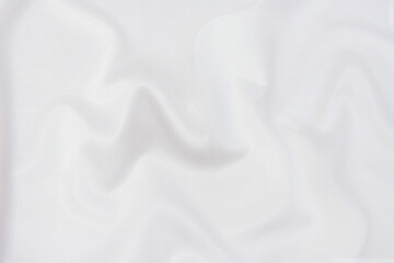 Wall Mural - Abstract and soft focus wave of white or ivory fabric background, white ivory texture and detail