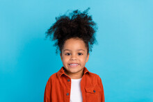 Portrait Of Cute Little Smiling Girl With Funny Chevelure Hairdo Wear Cool Jacket Isolated On Blue Color Background