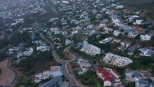 Aerial Panorama Of Luxury Accommodation In Camps Bay, Cape Town, South Africa. Drone Shot