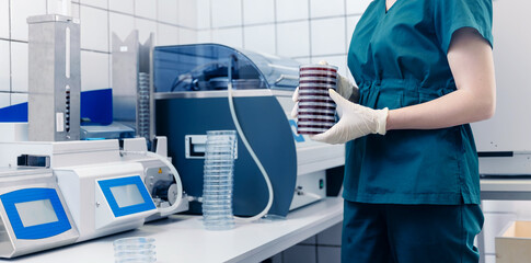 Wall Mural - scientist nurse downloads blood test samples to dna, hiv, aids, coronavirus on analysis laboratory b