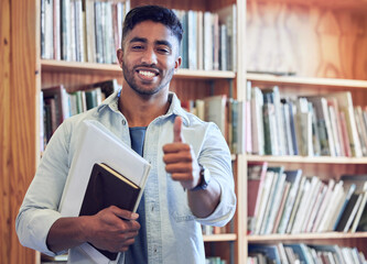 Poster - Put me to the test and Ill be the best. Shot of a young man showing thumbs up in a library at university.