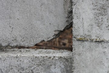 Canvas Print - gray stone texture from an old concrete wall with a big  brown hole