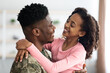 © Prostock-studio - Cute black girl enjoying reunion with her father soldier