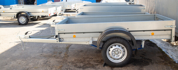 Open car trailer. Trailer for passenger cars.Sale, rental and maintenance of trailers.