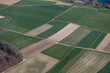 aerial view vast agricultural fields in Berner Seeland