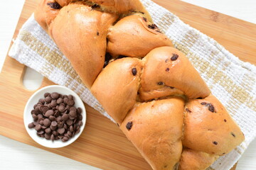 Sticker - Artisanal bread with a touch of chocolate, displayed on white wood