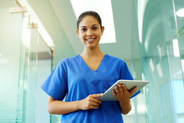 Aufkleber - Shell help you protect your greatest asset your health. Portrait of a young nurse using a tablet while standing inside a clinic.
