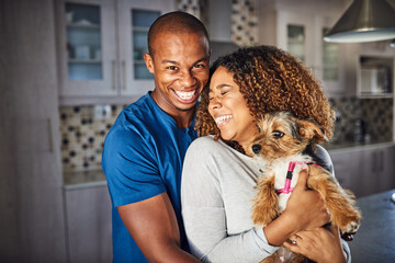Aufkleber - Hes simply the best. Cropped shot of an affectionate young couple standing with their puppy in the kitchen at home.