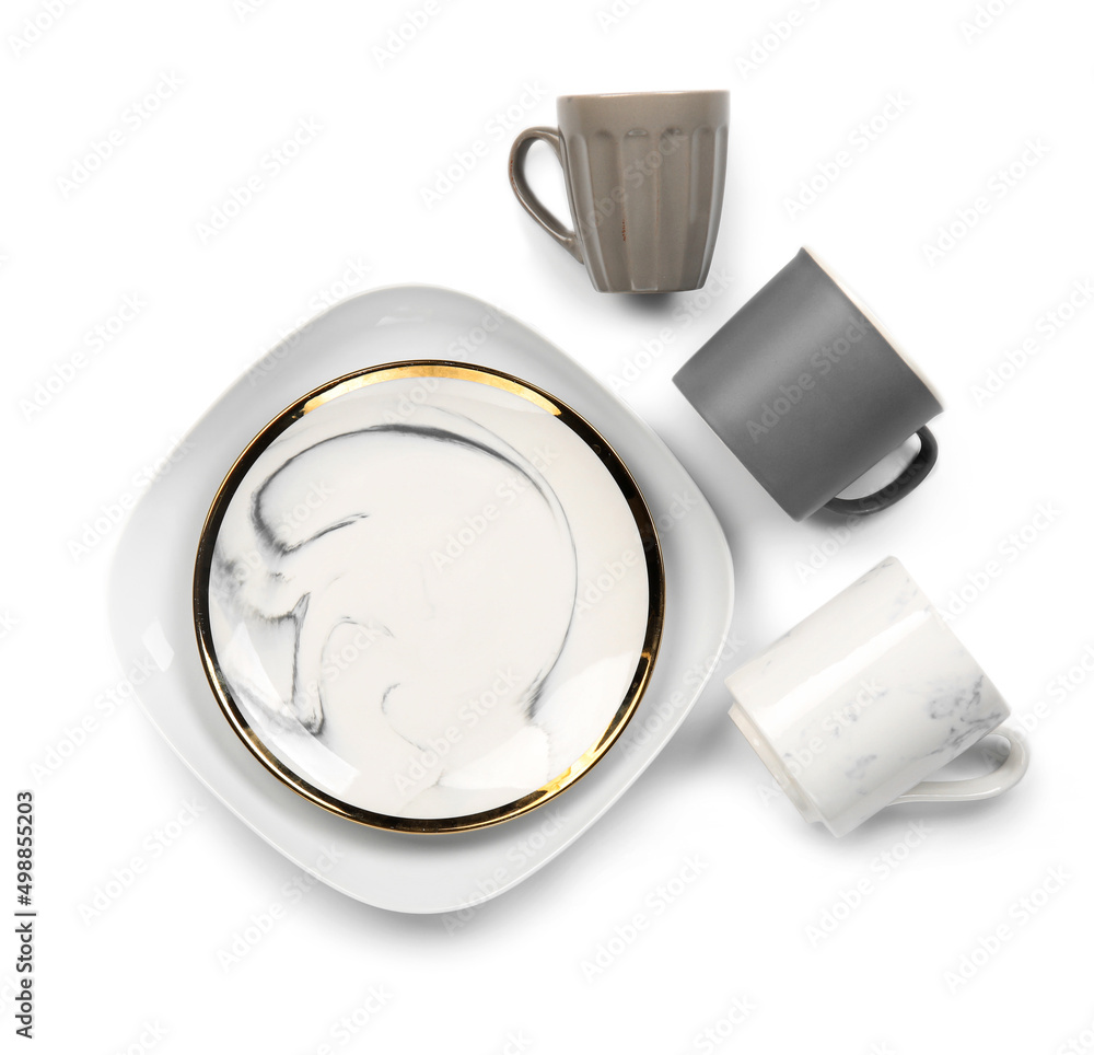 Set of stylish dinnerware on white background