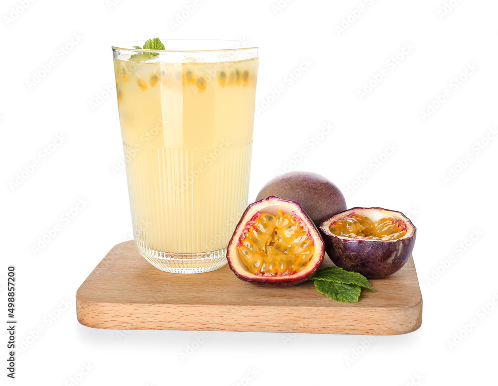 Glass of delicious passion fruit juice on white background
