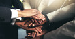 © Ruan J/peopleimages.com - Together is how well achieve the best. Closeup shot of a group of unidentifiable businesspeople joining their hands in a huddle.