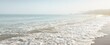 Panoramic view of the Baltic sea shore in a fog at sunrise. Beach, sand dunes. Soft sunlight. Idyllic summer seascape. Nature, environment, vacations, ecotourism, walking and exploring concepts