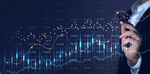 Stock market invest and crypto currency. Trader analyzing data on virtual screen. Price graph and indicator. Stock market and business investment.	