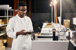 © sata_production - African engineer with tablet at factory