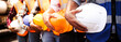 © Chalermphon - Engineer team holding hardhat standing in row ready for work.Worker diversity group wearing vest,ppe for safety in site train garage.Expert construction project manager leadership.banner cover design.