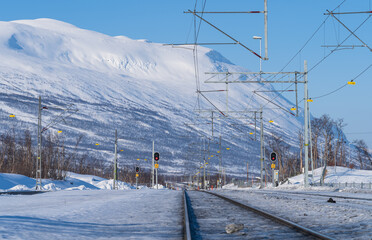 Fototapete - Railway tracks at Abisko Ostra, in Swedish Lapland, a popular travel destination.