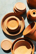 © Image Source - Studio shot of terra cotta pots