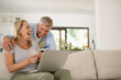 © Jadon Bester/peopleimages.com - Laughter is our secret to a everlasting love. Shot of a mature couple laughing at something they saw on the laptop.