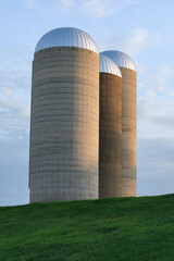 tower, silo, sky, industry, blue, architecture, agriculture, industrial, building, farm, structure, metal, rural, business, nature, grain, landscape, farming, steel, field, plant, energy, power,tower