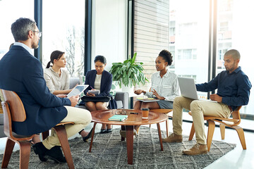 Aufkleber - Shes bringing some new ideas to the table. Shot of a group of work colleagues talking together in a meeting in an office.