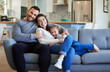 © Nina Lawrenson/peopleimages.com - They are my source of comfort. Shot of a young family relaxing on the couch at home.