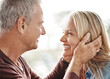 © T Hinrichsen/peopleimages.com - My love, my life, my beautiful wife. Shot of an affectionate mature couple sharing a romantic moment at home.