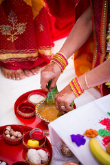 Indian pre wedding haldi ceremony turmeric, hands, feet close up