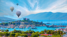 Hot Air Balloon Flying Over Saint Peter Castle (Bodrum Castle) And Marina In Bodrum, Turkey