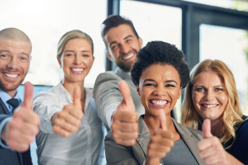 Poster - Youre doing great as long as youre giving your best. Portrait of a group of businesspeople showing thumbs up together in an office.