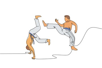 One continuous line drawing of two young sporty Brazilian fighter men training capoeira on the beach. Healthy traditional fighting sport concept. Dynamic single line draw design vector illustration