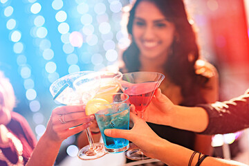 Poster - Toast to the weekend. Cropped shot of a group of women celebrating with cocktails at a party.