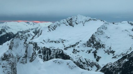 Wall Mural - 4k aerial of tantalus range in the coast mountains in late winter, british columbia, canada