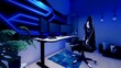 © Phacharida - Workplace for the professional gamer in computer games, online tournaments, comfortable chair, backlit keyboard, monitors, blue  backgrounds