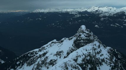 Wall Mural - 4k aerial of tantalus range in the coast mountains in late winter, british columbia, canada
