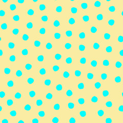 Seamless hand drawn polka-dot pattern on light background for surface design and other design projects