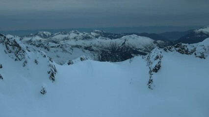 Wall Mural - 4k aerial of tantalus range in the coast mountains in late winter, british columbia, canada