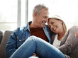 © T Hinrichsen/peopleimages.com - Days well spent bring a life of content. Shot of an affectionate mature couple relaxing together on the sofa at home.