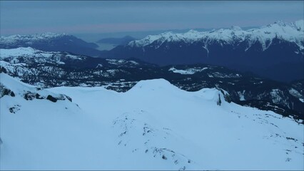 Wall Mural - 4k aerial of the coast mountains in late winter, garibaldi provincial park, british columbia, canada